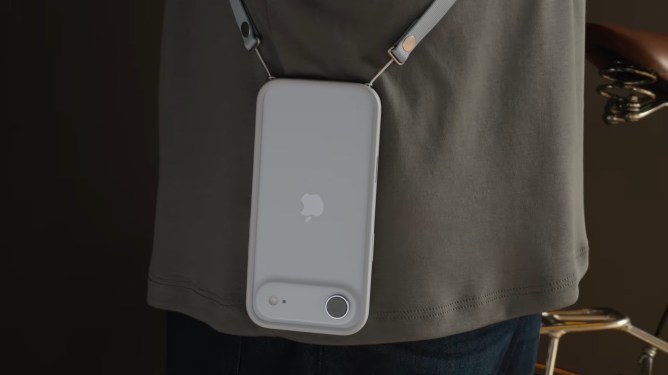 iPhone hanging from Apple Crossbody Strap