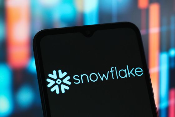 In this photo illustration, the Snowflake logo is seen displayed on a smartphone screen.