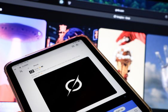 In this photo illustration, a link to the Grok website is seen in an X post on an iPad