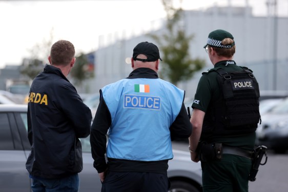 An Garda Siochana and Police Service of Northern Ireland officers outside the ground ahead of the UEFA Conference League play-off match at Clearer Twist National Stadium at Windsor Park, Belfast.