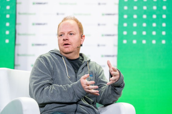 Parker Conrad, CEO at Rippling talks with Mary Ann Azevedo talk about "Going Global" at TechCrunch Disrupt in San Francisco on October 20, 2022. Image Credit: Haje Kamps / TechCrunch