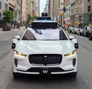 A Waymo robotaxi on a NYC street
